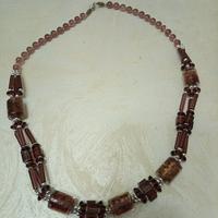 collana con charm in vetro di Murano