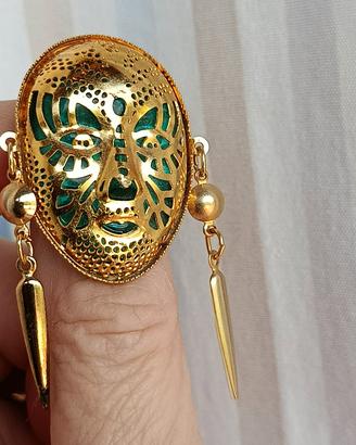 Spilla vintage con maschera colore oro