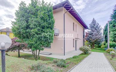 TRILOCALE CON GIARDINO, TAVERNA E BOX