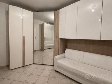 Armadio a ponte camera da letto+ divano