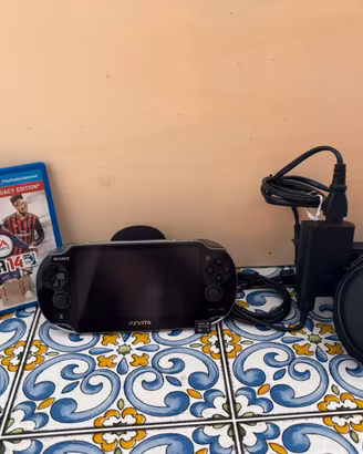 Ps vita, carica batteria, fifa 14 e sch. memoria