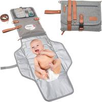 Fasciatoio portatile con tasche