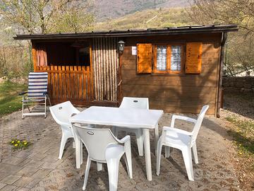 Caravan con casetta in legno