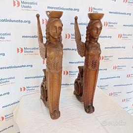 Coppia di cariatidi in legno intagliato