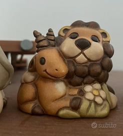 Coppia nemici e amici thun (leone e antilope)