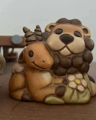 Coppia nemici e amici thun (leone e antilope)