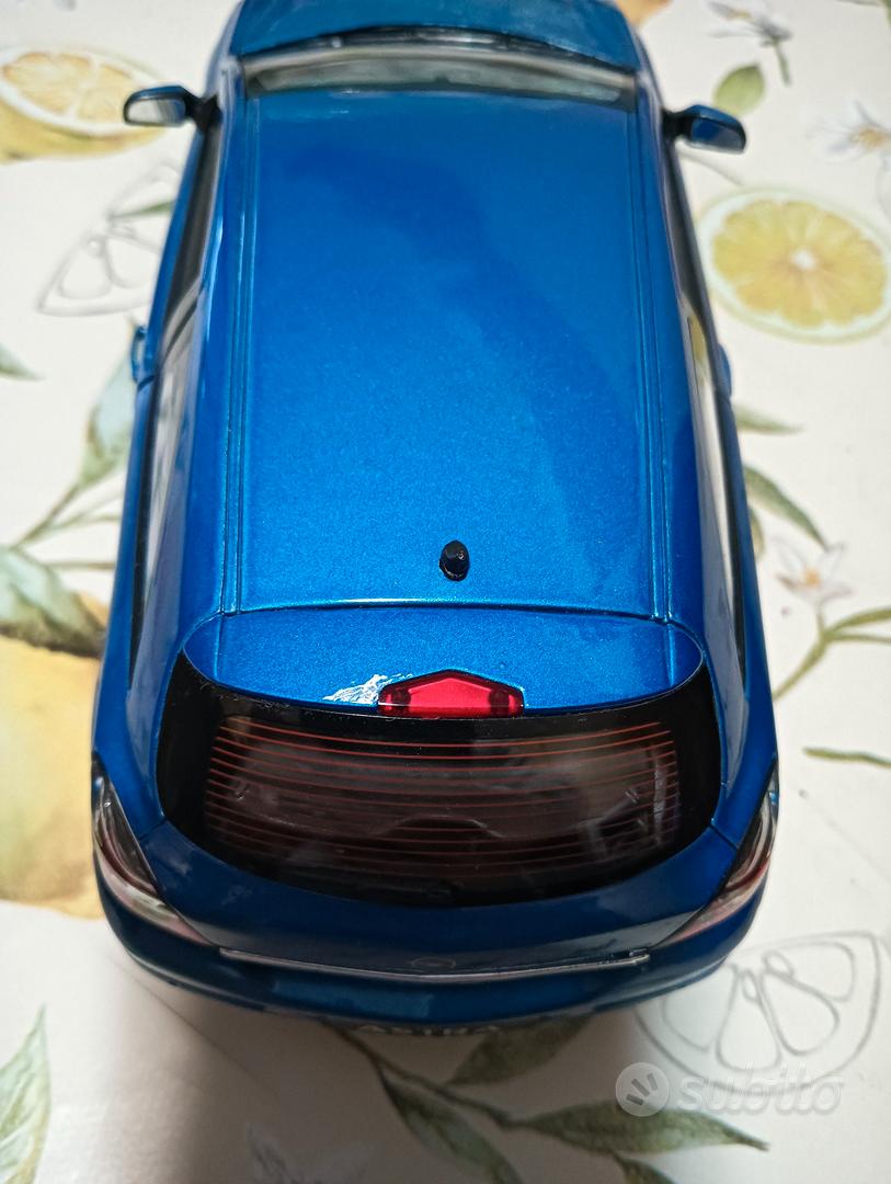 BLITZ VERSAND Opel Astra GTC 2005 silber silver Welly Modell Auto 1:34-39NEU/OVP