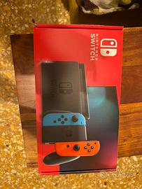NintendoSwitch con scatola cavi e stato perfetto