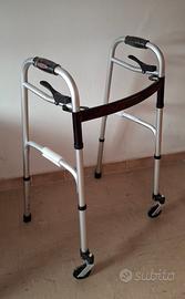 Deambulatore fisso push-down con ruote piroettanti