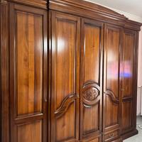 Camera da letto in noce massello