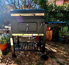 Barbecue a carbonella nero con ruote