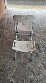 Sedia con rotelle e sgabello
