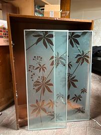 Libreria ikea marrone con ante vetro