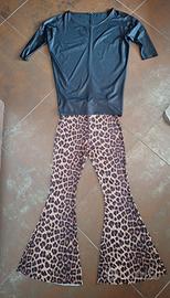 completo maglia lucida e pantaloni zampa