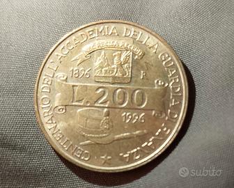 Moneta 200 lire e gettone telefonico 