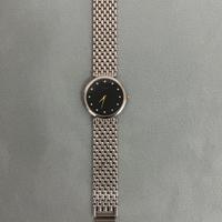 Orologio trucchi in acciaio