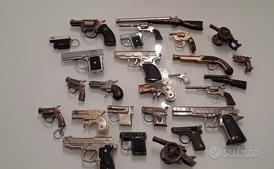 collezione accendini pistole e cannoni 