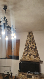 Set in ferro battuto protezione camino e accessori