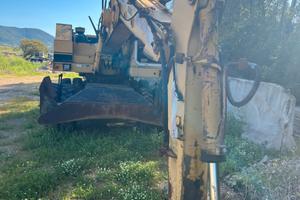 Escavatore cat 212