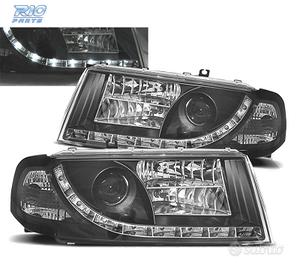 FARI SKODA OCTAVIA 01-04 LUCE DIURNA LED FONDO NER