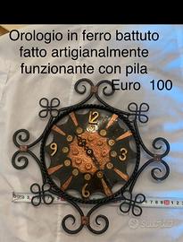 orologio ferro battuto da parete