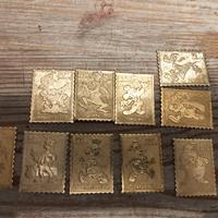 francobolli metallici