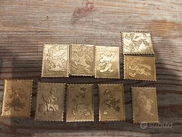 francobolli metallici