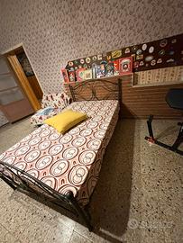 Letto in ferro battuto con doghe