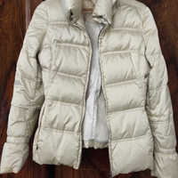 Piumino beige dorato Geospirit