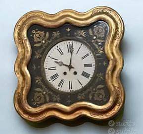 Antico orologio da parete