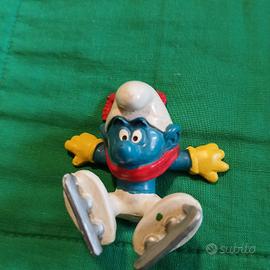 Puffo pattinatore ghiaccio