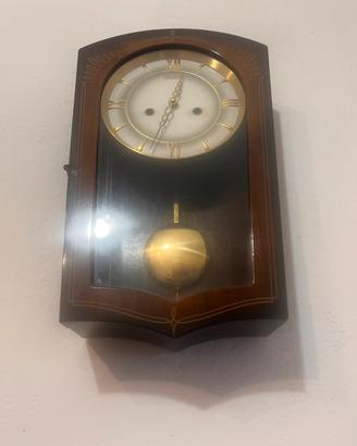 Orologio a pendolo da parete