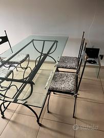 Tavolo in cristallo e ferro battuto