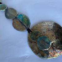 Pendente raku composto da 4 dischi