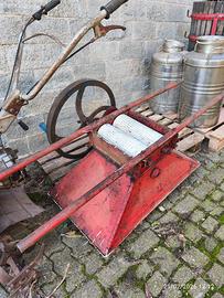 Pigiatrice manuale con contenitori