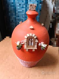 salvadanaio in terracotta decorato a mano