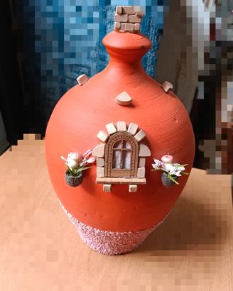salvadanaio in terracotta decorato a mano