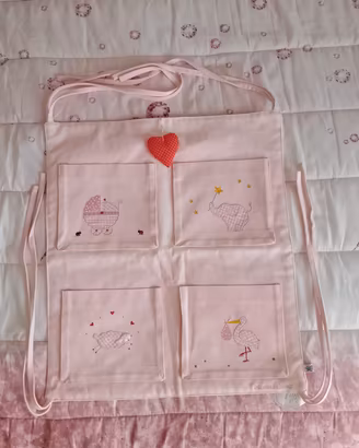 Pannello portaoggetti per cameretta bebè rosa 