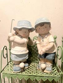 Statue in resina bambini che giocano a golf