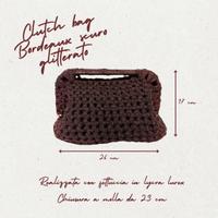 Clutch bag all’uncinetto bordeaux scuro glitterato