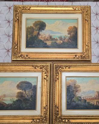 Quadri con cornice lavorata in legno dorato.