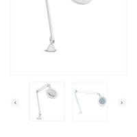 Lampada con lente ingrandimento