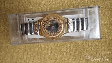 Orologio Swatch colore acciaio e oro