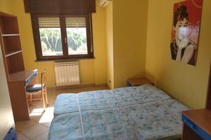 Privato fitta a studenti una stanza doppia