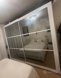camera da letto bianco lucida