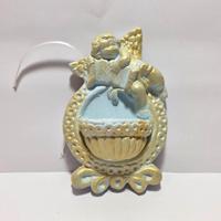 Piccola acquasantiera in terracotta  con angelo