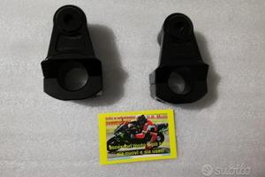 Semimanubri rialzati regolabili orientabili