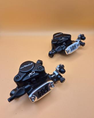 Coppia pinze freni ibridi Trp HY/RD