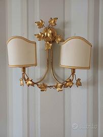 Coppia di applique in foglia d'oro