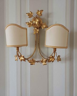 Coppia di applique in foglia d'oro